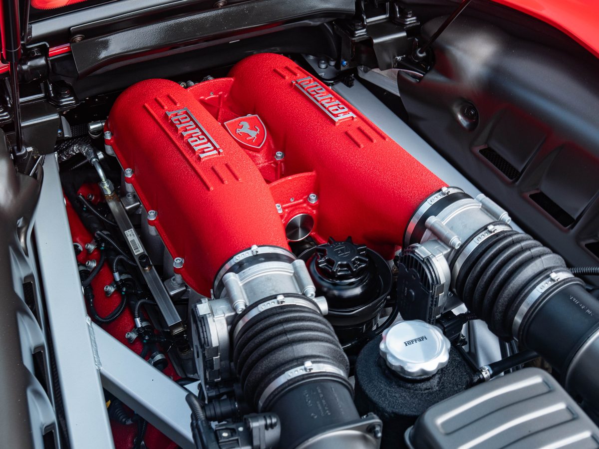 Embossed Ferrari shield cast into the engine cover
